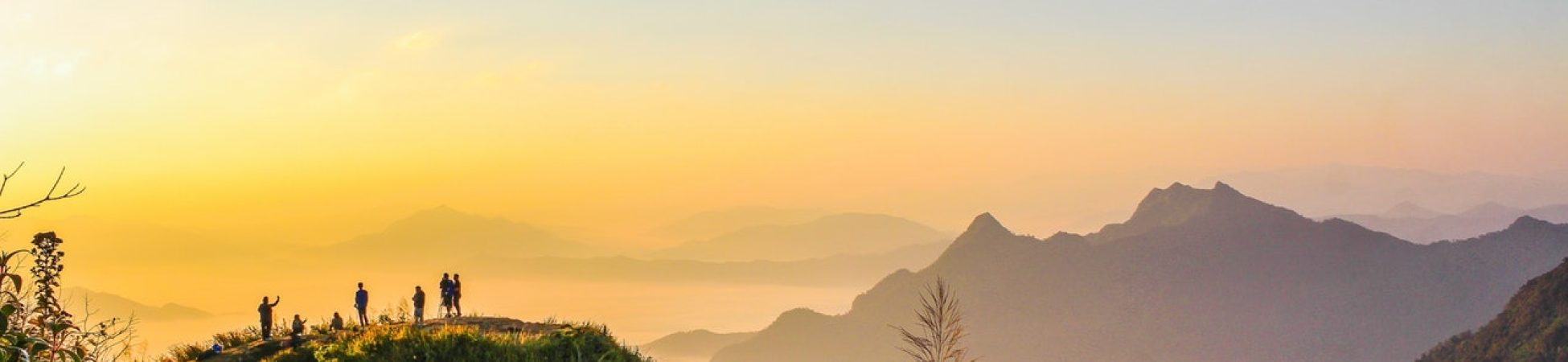 photo of people standing on top of mountain near grasses 733162.jpg